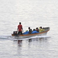 Daughter Gloria with cousin Grace and Andie's mum on their way back to Supato. School starts on Monday!